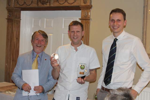 Image of Andy Dobinson with the players player of the year award